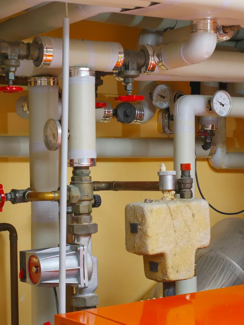 Neatly run water supply pipes and shut-off valves